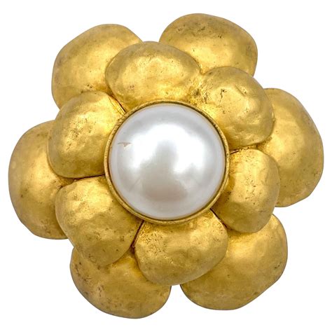 chanel camellia flower ring price|chanel camellia brooches.